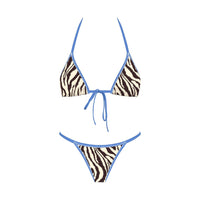 Zebra print bikini with blue straps on a white background