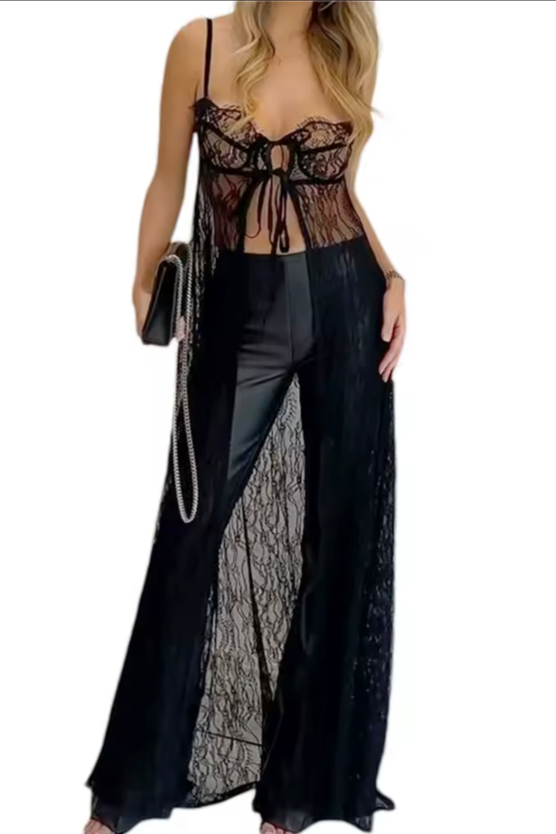 Black lace lingerie set with matching long black dress on a white background