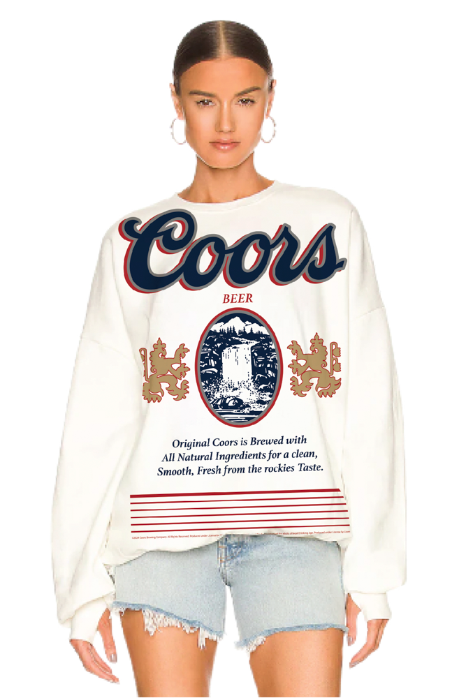 Person wearing a Coors beer sweatshirt on a white background