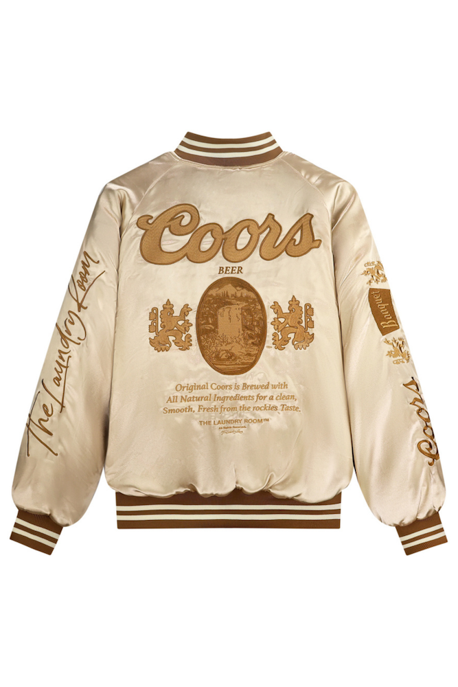 Beige satin jacket with Coors branding on a white background